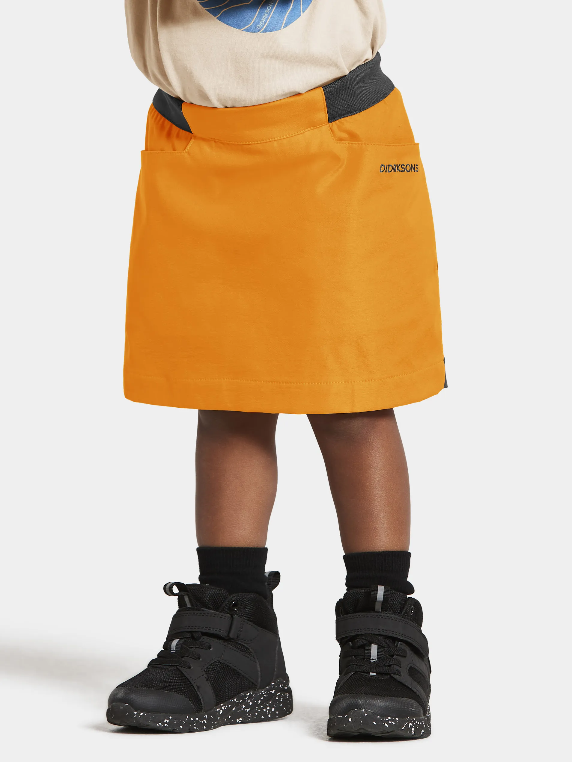 Didriksons Kids&#x27; Barret Skirt Happy Orange | Buy Didriksons Kids&#x27; Barret Skirt Happy Orange here | Outnorth